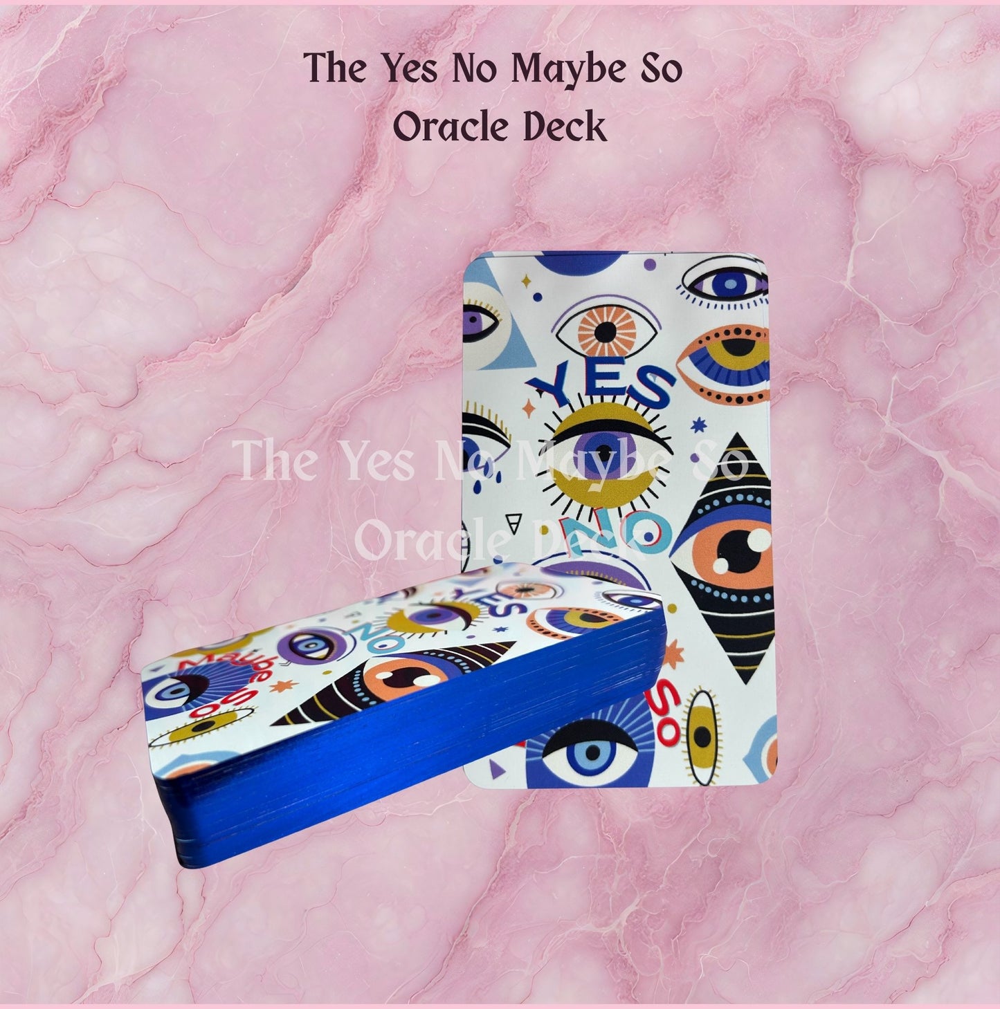 Oracle deck with colorful design on a pink marble background
